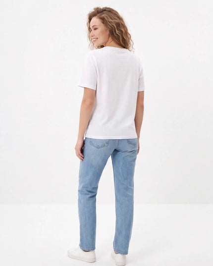 Tailored Monochrome Tee White — movement lifestyle shot showing breathable mid-weight cotton in motion