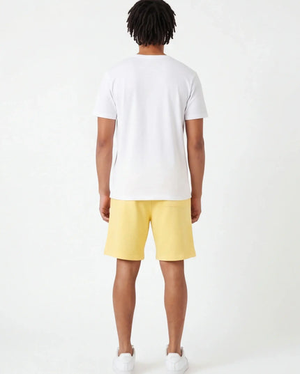 Maison Grozavu Stone Trousers Volume — side profile view showing the shoulder drop and sleeve length