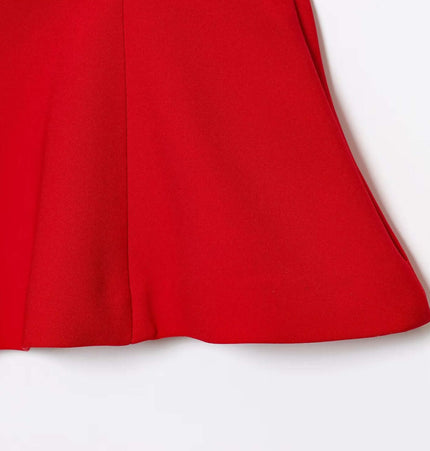 Close-up view of the hem of the red Grozavu Strapless Camisole Tank Top – Slim Fit, showcasing its elegant skirt style.