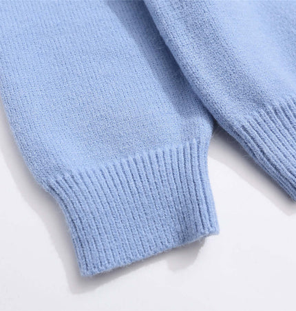 Retro Cartoon Jacquard Hoodie - Loose Fit close-up of soft blue sleeves and ribbed cuffs