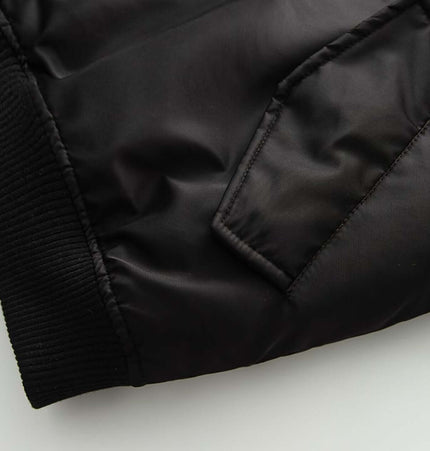 Close-up of the sleeve detail on the Retro Flight Jacket – Oversized, showcasing its durable fabric and stylish design.