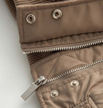 Close-up of zippers and buttons on the Retro Flight Jacket – Oversized, showcasing its detailed design and quality.