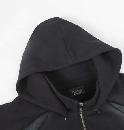 Patchwork Half-Zip Hoodie with a stylish hood and black fabric detail.