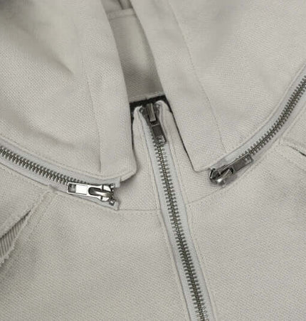 Close-up view of the Patchwork Half-Zip Hoodie showcasing its stylish zipper and textured fabric.