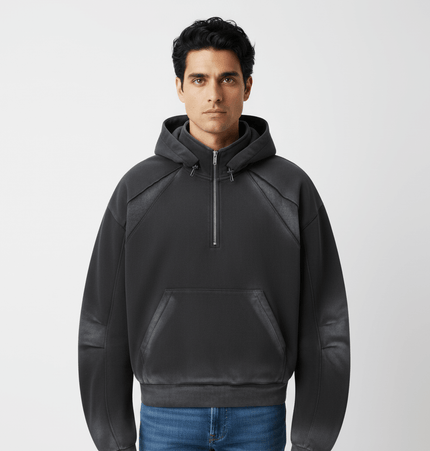 Model wearing a Patchwork Half-Zip Hoodie, featuring a stylish design with a half-zip closure and hood.