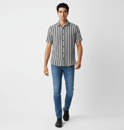 Retro Stripe Short Sleeve Shirt – Loose Fit worn by a man with blue jeans, showcasing vintage-inspired street style.