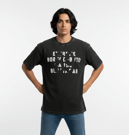 Retro Waffle Washed Cotton TShirt worn by a young man in a relaxed pose, showcasing its unique textured design.