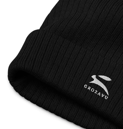 Ribbed knit beanie by Grozavu, featuring a stylish design and black ribbed texture.