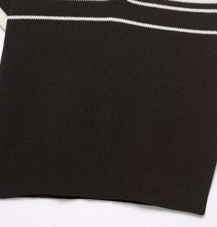 Ribbed Stripe Knit Polo Shirt – Loose Fit close-up showing ribbed texture and stylish stripes in black and cream.