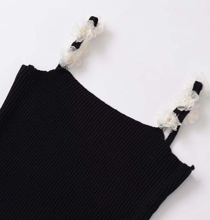 Round Neck Flower Knit Top – Sleeveless detail featuring flower straps and soft texture.