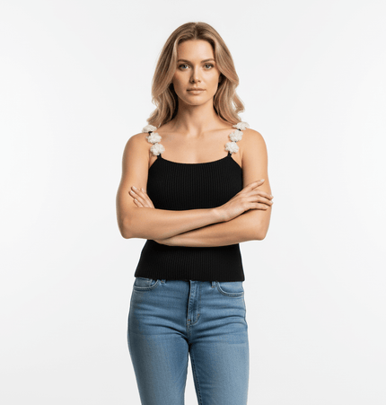 Round Neck Flower Knit Top – Sleeveless worn by a model with floral straps and a confident pose.