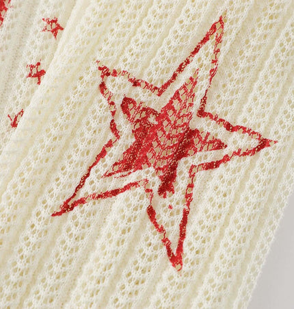 Close-up of Round Neck Jacquard Knit Sweater featuring red star design on cream knit fabric.