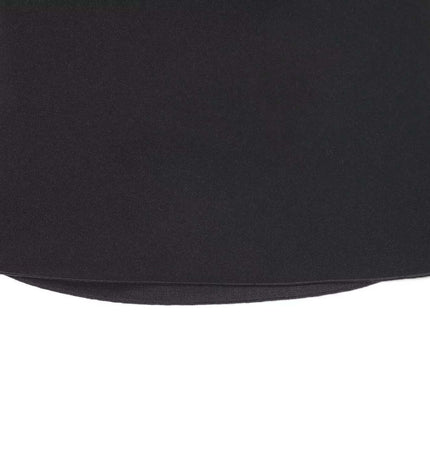 Close-up image of the bottom hem of the Round Neck Knit Top – Slim Fit in black fabric.