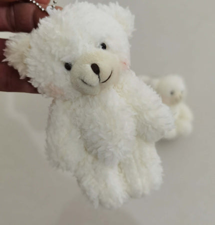 Shy Blush Bear Plush Keychain held in hand, featuring soft fur and cute facial expression, ideal for accessories.