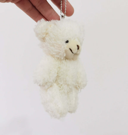 Cute Shy Blush Bear Plush Keychain held by hand, perfect for bags and keys.
