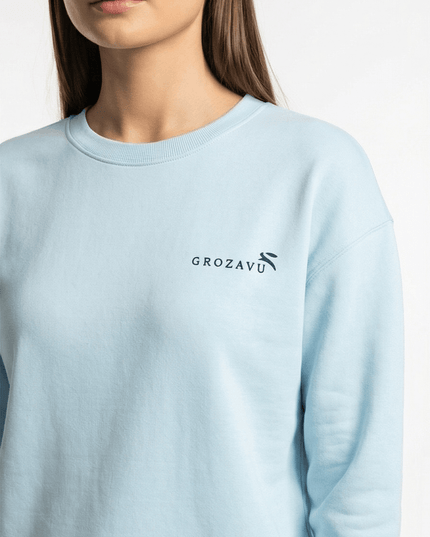 Front view of the Maison Grozavu Sleek Bone Tee in tee — showing the tailored hem.