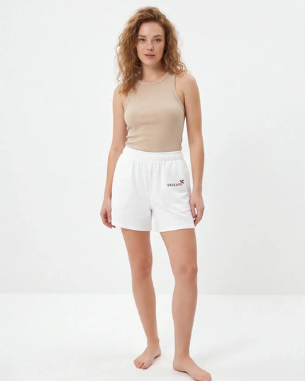 Maison Grozavu Chalk Shorts Mark — rear view displaying the back panel detailing and structured hemline in White