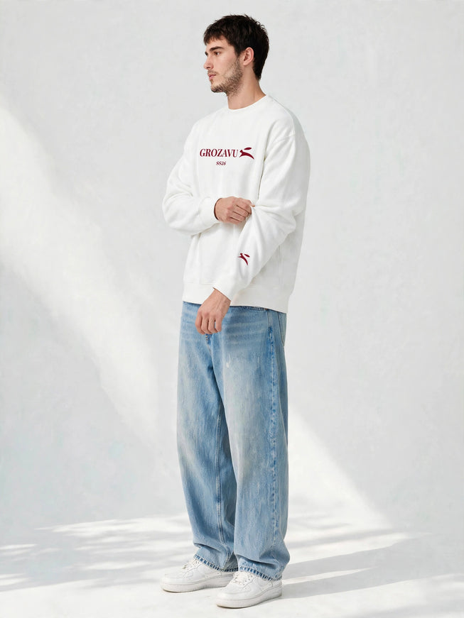 Sleeve logo detail on the white 350 g/m² organic cotton crewneck