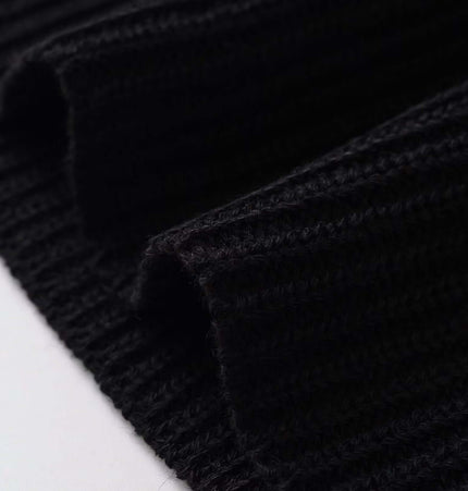 Close-up of the texture of the Round Neck Flower Knit Top – Sleeveless fabric showcasing its knitted pattern.