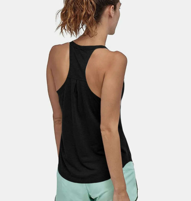 Slim Fit Cotton Scoop Neck Tank Top in black, back view, paired with light green shorts for active wear.