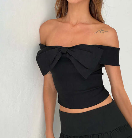 Slim Fit One-Shoulder Bow Top featuring a stylish bow accent and a flattering slim fit silhouette for a chic look.