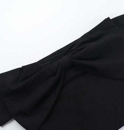 Close-up of the bow detail on the Slim Fit One-Shoulder Bow Top, highlighting its elegant design.