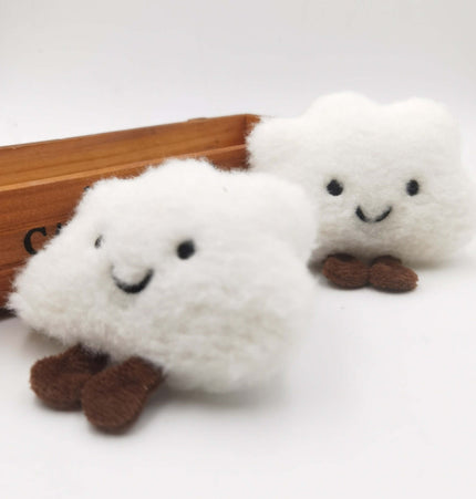 Smiley Cloud Plush Keychain featuring cute fluffy cloud characters with smiling faces and little brown feet.