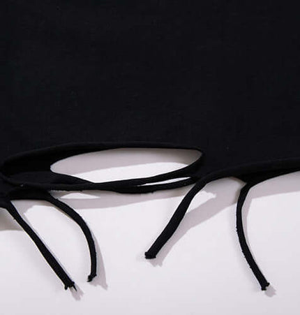 Smiley Graffiti Print Sleeveless Tank Top featuring slashed hole detailing for a bold urban look.