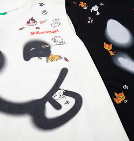 Smiley Graffiti Print Sleeveless Tank Top showcasing playful cat graphics on light and dark fabrics.