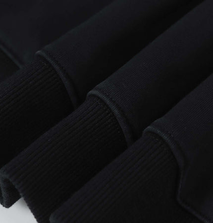 Close-up of the cuffs of the Splashing Ink Spliced Hooded Sweatshirt showcasing the soft fabric and ribbed details.