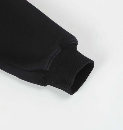 Close-up of sleeve cuff from Splashing Ink Spliced Hooded Sweatshirt, showcasing the comfortable and stylish design.