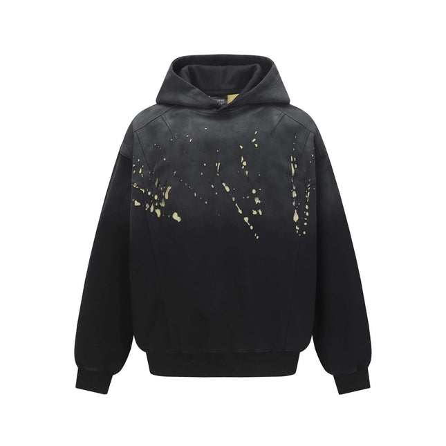 Splashing Ink Spliced Hooded Sweatshirt featuring a unique splashing ink design and comfortable loose fit.