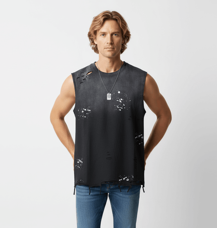 Man wearing a Splatter Ink Tank Top – Loose Fit with distressed details and a stylish, casual look.