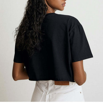 Sport Crop Cotton Top - Loose Fit, back view of woman in black cropped cotton top.