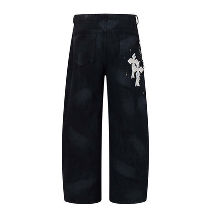 Straight Leg Patchwork Denim Jeans with artistic cross patch embroidery and hand-painted detailing on the back.