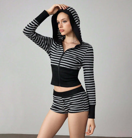 Striped Slim Fit Hooded Shorts Tracksuit featuring a stylish woman wearing a hooded top and matching shorts.