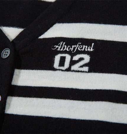 Striped VNeck Knit Cardigan – Slim Fit featuring a black and white striped design and embroidered details.