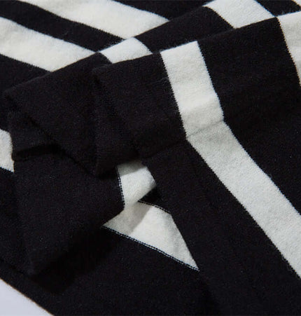 Close-up of the Striped VNeck Knit Cardigan – Slim Fit showcasing the black and white jacquard color-block striping.