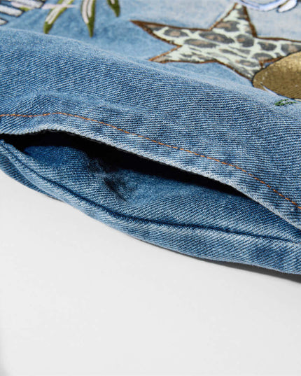 Detail shot of the Maison Grozavu Quartz Jacket Issue in jacket — showing the refined stitching.