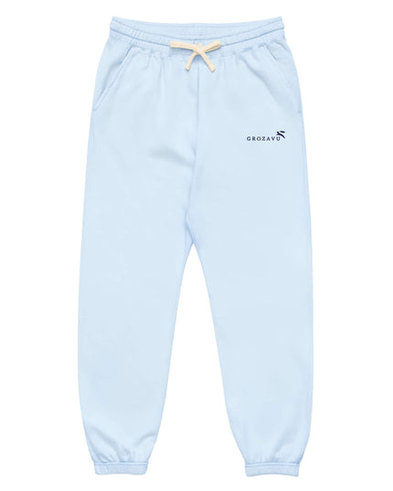 Front view of the Maison Grozavu Timeless Umber Trousers in pants — showing the tailored hem.