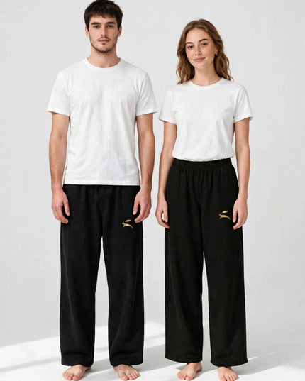 Two models in the black everyday wide-leg pants, studio shot