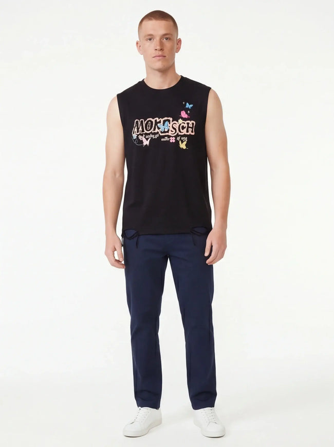 Maison Grozavu Resilient Top - Iron Silhouette in black — front view showing the subtle drape of the fabric