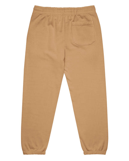 Detail shot of the Maison Grozavu Archival Umber Trousers in supreme — showing the relaxed fit.