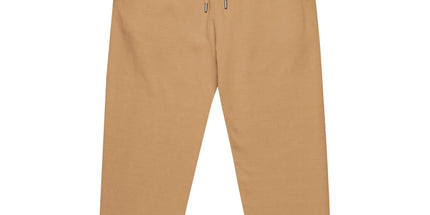 Detail shot of the Maison Grozavu Archival Umber Trousers in supreme — showing the tailored hem.