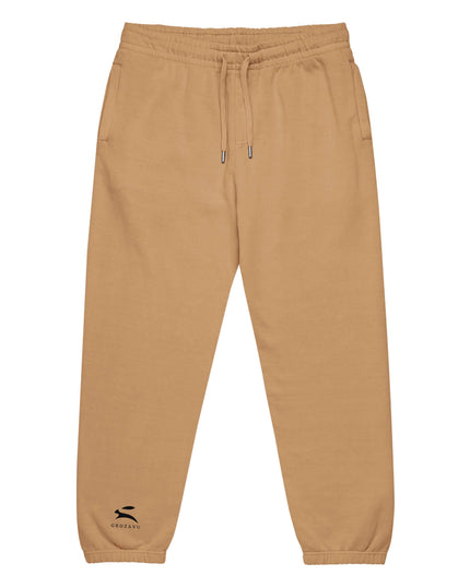 Detail shot of the Maison Grozavu Archival Umber Trousers in supreme — showing the tailored hem.