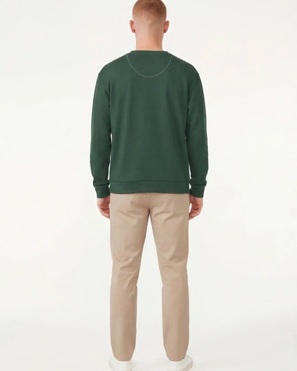 Rear view of the Maison Grozavu Uncompromising Iron Sweater in collection — showing the relaxed fit.