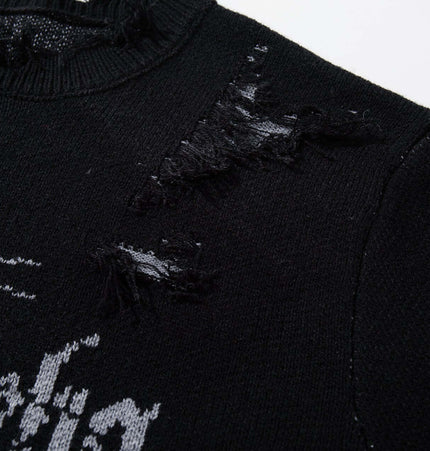 Tassel Distressed Knit Sweater – Loose Fit close-up of distressed detailing and jacquard pattern.