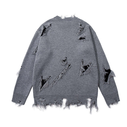 Back view of the Tassel Distressed Knit Sweater – Loose Fit showcasing its rugged, distressed design.