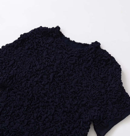 Texture Knitted Bow Round Neck Top in navy with a textured fabric and round neckline, showcasing its elegant design.