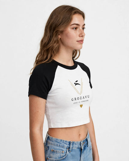 Three-quarter view of the micro rib raglan baby tee, black sleeves